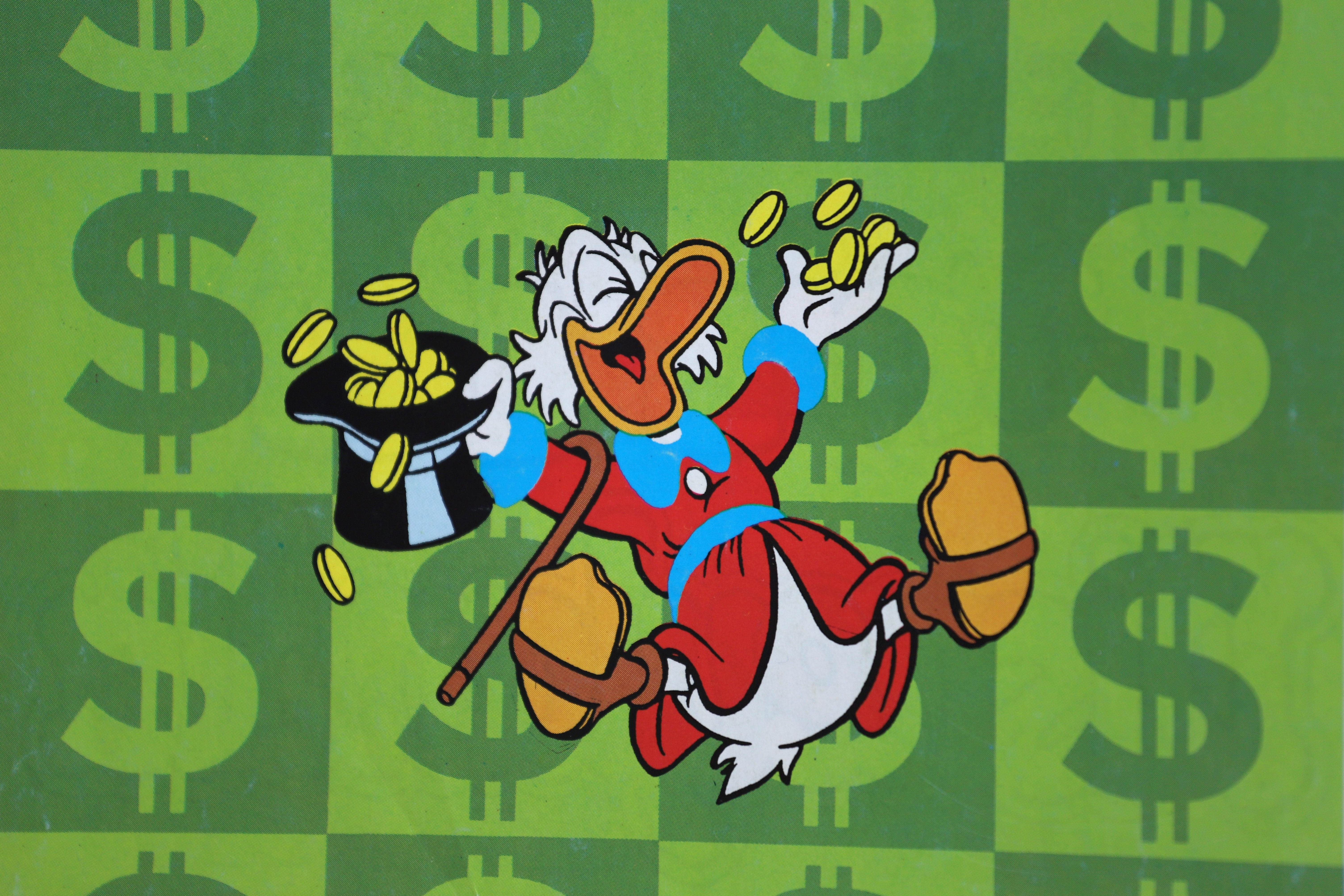 A cartoon duck with a top hat in hand, with money spilling out of the hat and across the background.